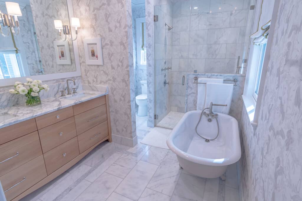 Photo of A Luxurious Bathroom with elegant fixtures for this renovation by Lanphear